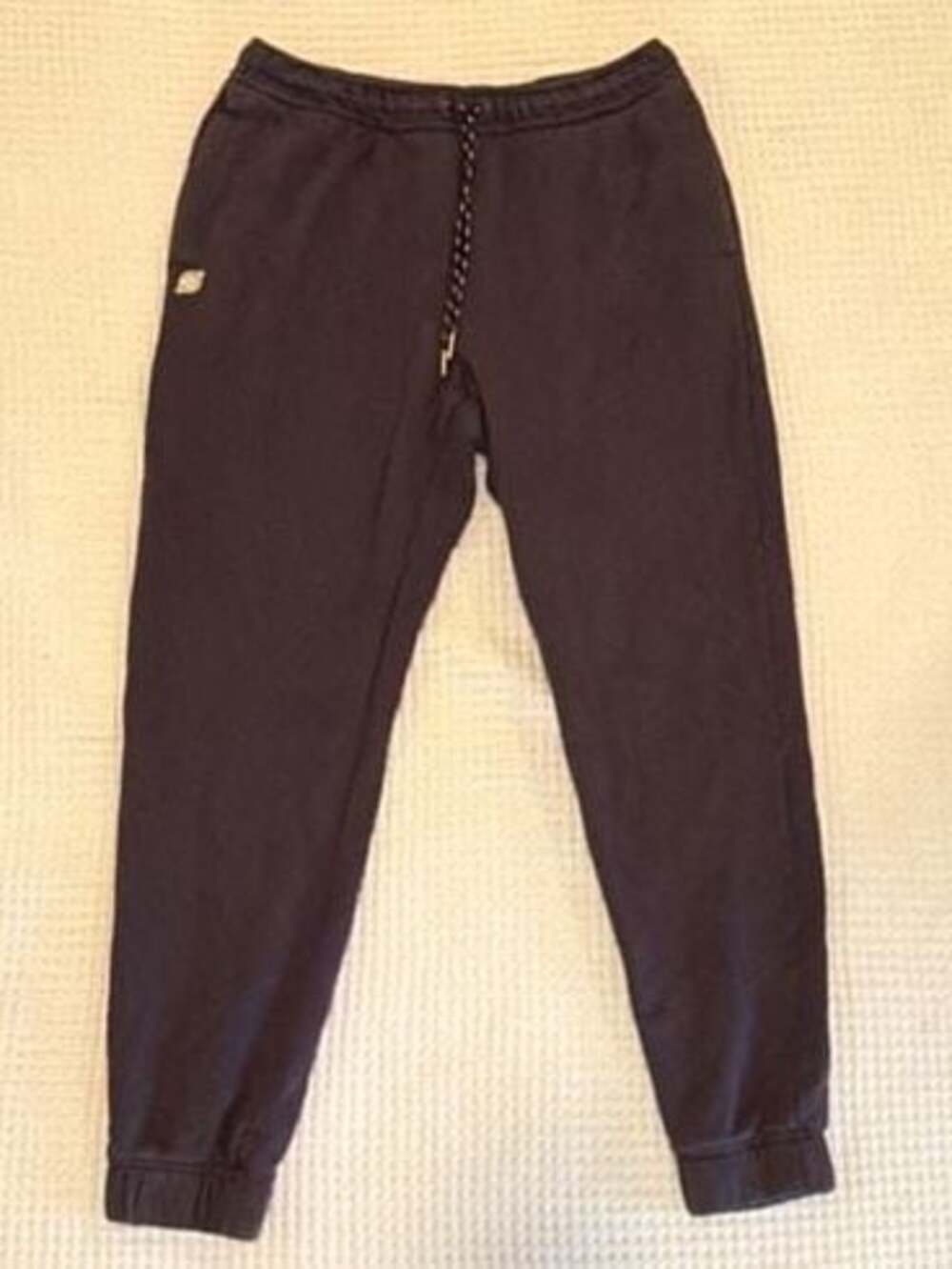 Peloton Women's Fleece Jogger Pants in Purple with Gold Logo Detail Med